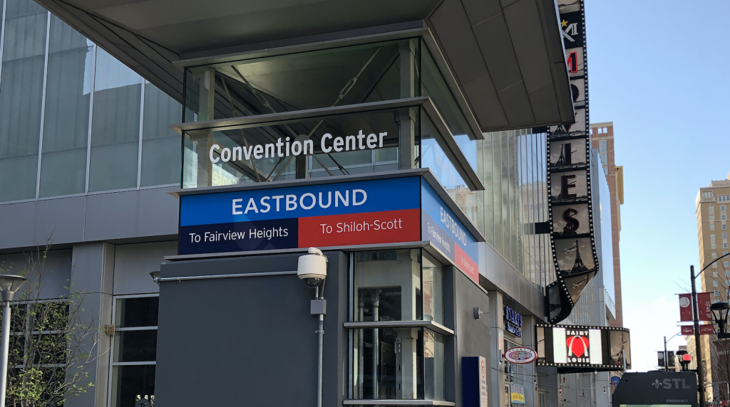 Elevator tower at street level with Convention Center signage