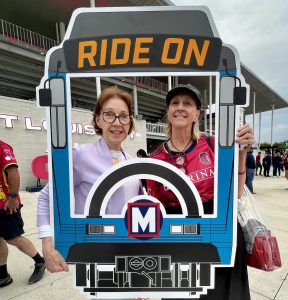 Customers engaged with the RIDE ON crew at City Stadium.