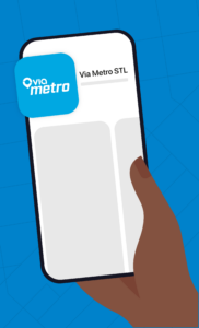 Illustration of hand holding mobile device with Via Metro app logo on screen