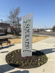 Photo of new artwork at updated bus stop at 13th and Gravois